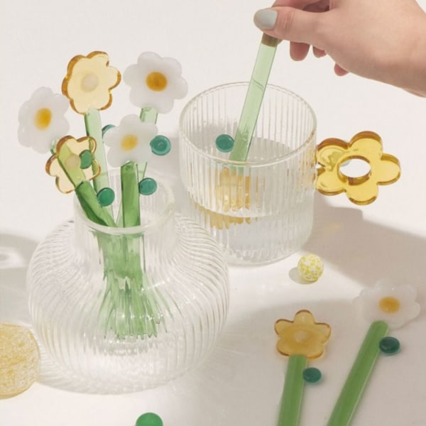 Mjölkskedar i glas Blomtesked A A A