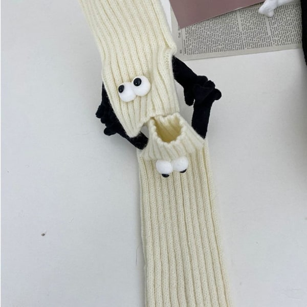 Magnetiska handhållande strumpor täcker par som håller handsockor white