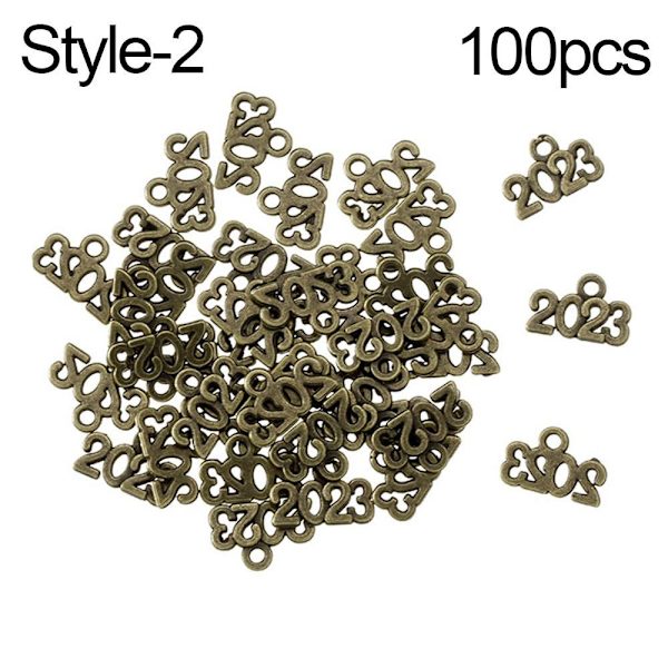 100 stk. Souvenirvedhæng 2023 kvast STYLE-2 STYLE-2 Style-2