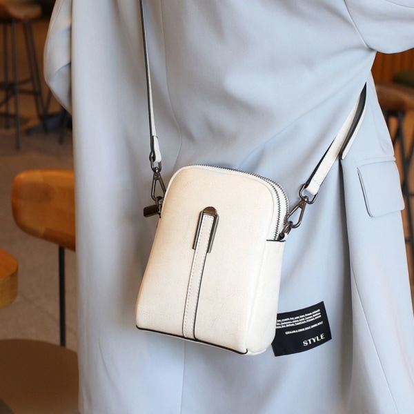Crossbody Olkalaukut Vetoketjukassit RUSKEA Brown