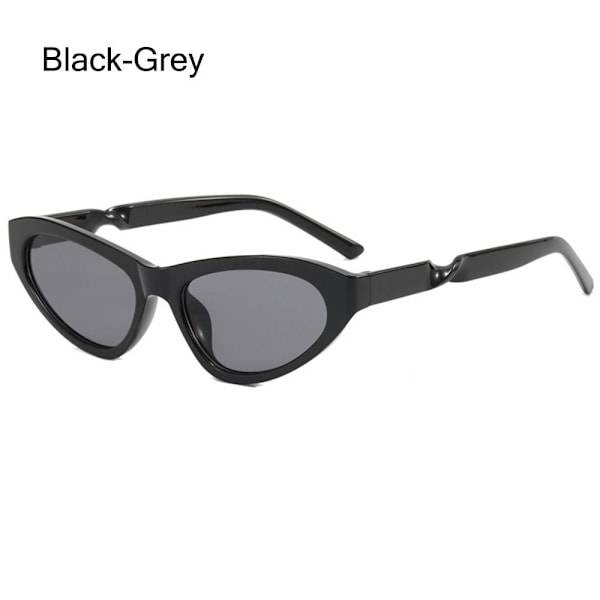 Soikeat aurinkolasit Cat Eye aurinkolasit MUSTA-HARMAA MUSTA-HARMAA Black-Grey