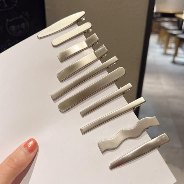 Metalliset hiusklipsit Hiuskiinnikkeet 9 9 9