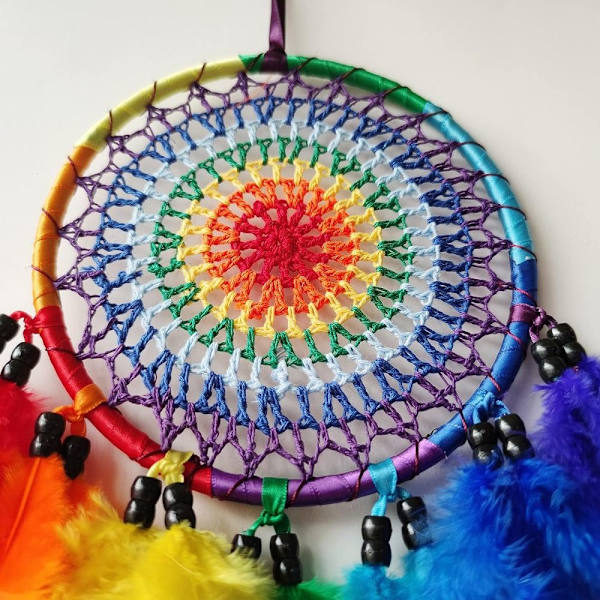 Unensieppaajat Värikäs höyhenen Unesieppari Rainbow Feather