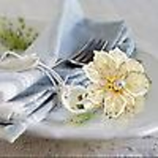 Servettringar, set om 12 servettringar i legering med utskuren blomma