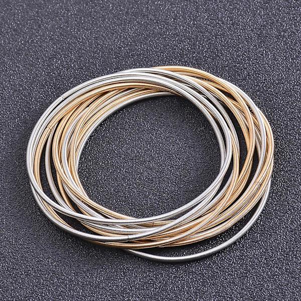 Hopfällbart armband i kolstål, stapelbart armband med gitarrsträngsfjäder