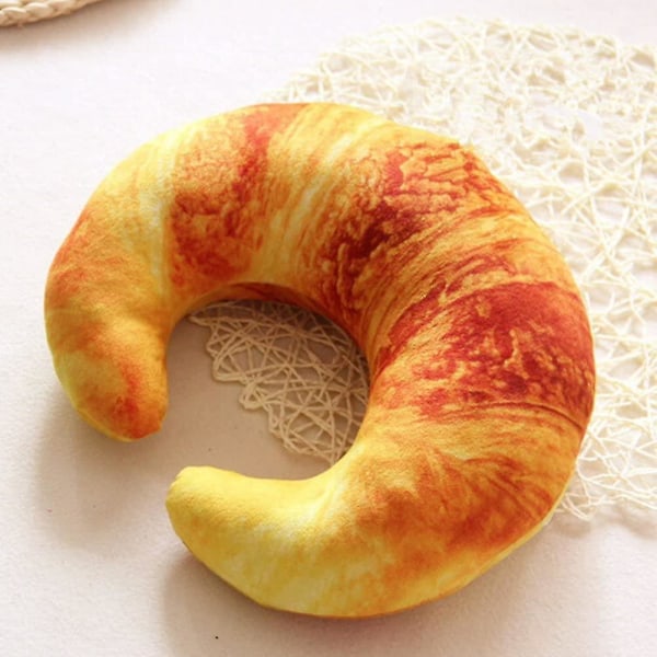 Croissant-jättityyny kirsikkakivilämmityspussilla matkaniskatyyny