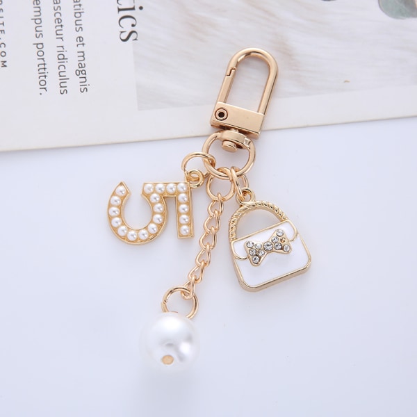 Xiaoxiang Metal 5-hahmoinen avaimenperä-käsilaukku, koristeellinen kristalliriipus avaimenperällä (valkoinen, 1kpl)