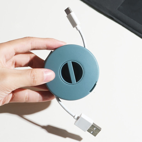 Pieni kannettava pyöreä pyörivä organizer Data USB -kaapelin tallennuskäämikotelo (sininen)
