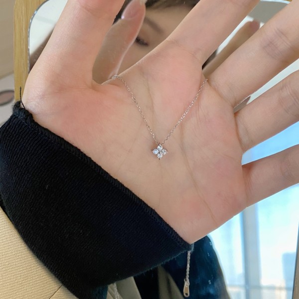 S925 sterling sølv japansk glitrende diamant-firkløver kragebenskjede for kvinner