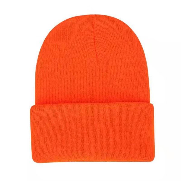 Ensfarvet strik beanie isoleret skihue, orange rød