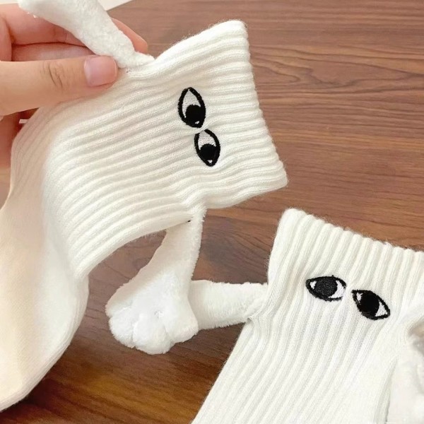 2 paria kädestä pitäen sukat, magneettinen hauska pitelee valkoisia