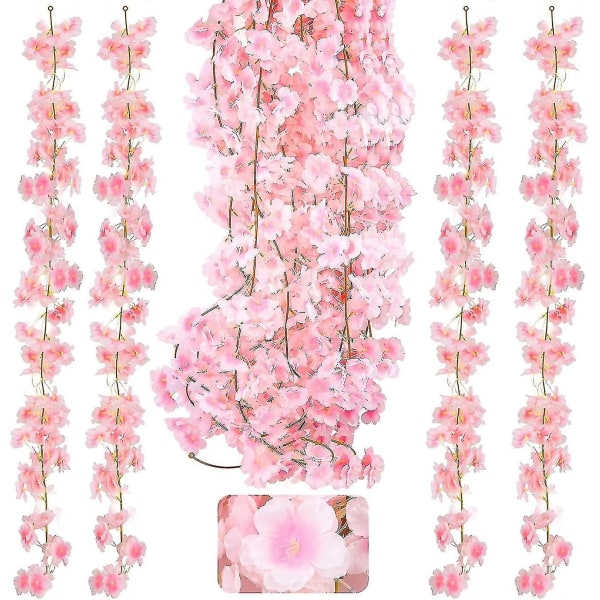 Set 4 x 1,8 m silkkiä keinotekoisia kirsikankukkaseppeleitä kotiin ripustettuna