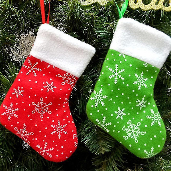Julstrumpor, paket med 6 snöflingor med plyschmanschetter, en klassisk stocred Bd