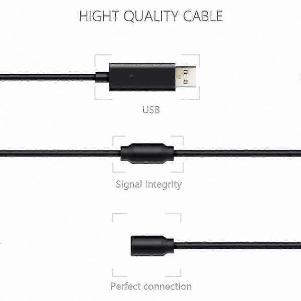 Musta USB-kaapeli ja adapteri ohjauspyörälle ja polkimille