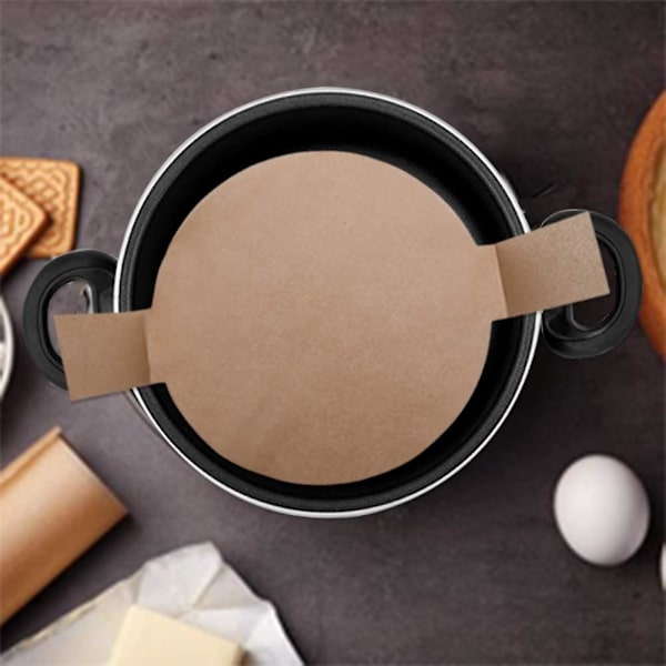 100 stk. Forkuttet sirkelformede kakeforme runde non-stick pergamentpapir med løftefliker for bakebryn