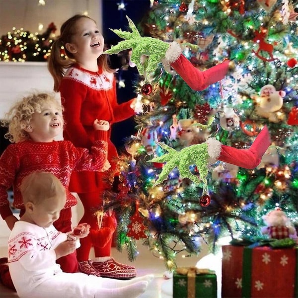 Kuinka Grinch varasti joulukuusen pehmokäsinuken joulupuun seppeleen koristeluun