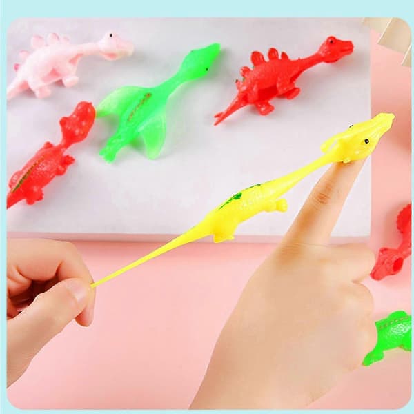 Dinosaur Finger Stretchy Toys Sling Shot för barn E
