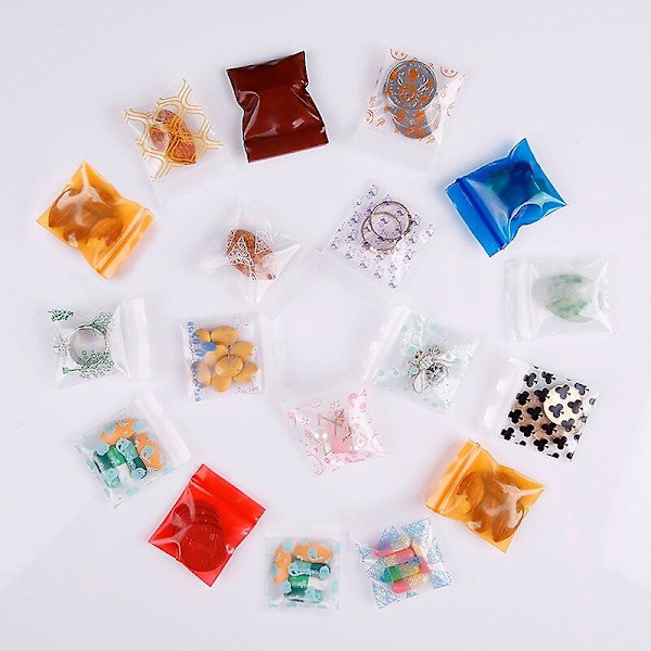 100 st/lot 4x5cm Låspåsar Genomskinlig plastpåsar med dragkedja med print för matförvaring Smyckeförpackningspåsar Söt Mini Zip COLOR L