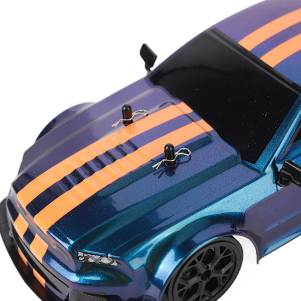 1/14 RC Driftbil Anti-Interferens 2.4G Fjernkontroll 4WD RC Racing Bilmodell med Frontlys 2 Sett Hjul Dobbelt Batteri
