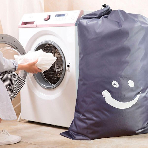 Tvättväska Nylon dragsko Cylinder för hushållsresor Smutsiga kläder Quilt Böcker Förvaring Mörkgrå Leende ansikte