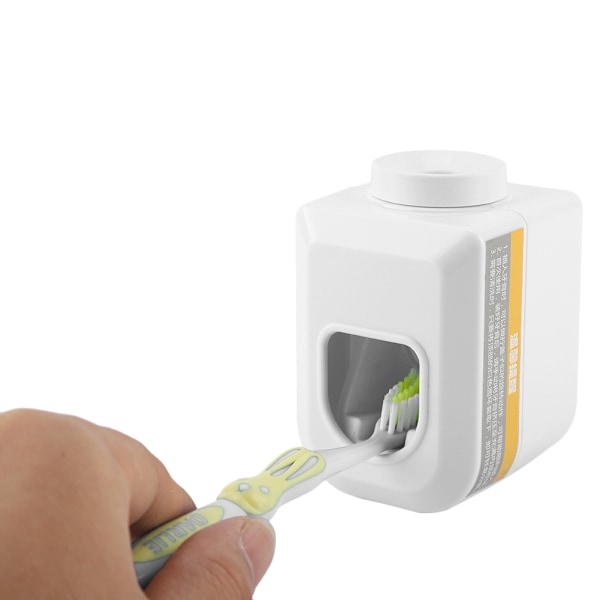Väggmonterad tandkrämsdispenser Automatisk squeezer tandkrämshållare Hemmabadrum (Vit)