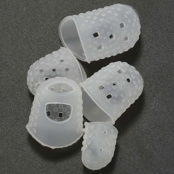 Kit med 8 stycken tumme- och fingerplektrum för gitarr (metall och blå celluloid)