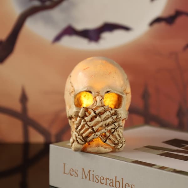 Lysande dödskalleprydnad i harts, Halloweendekoration