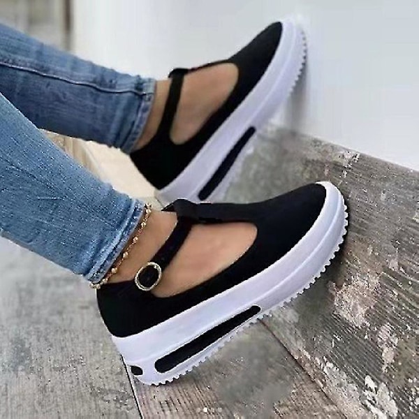 Vintage svarte slip-on plattformsko for kvinner med hul vrist