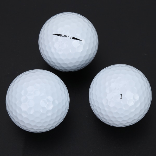 12 st/förpackning fyrlagers turneringsträningsbollar för golf