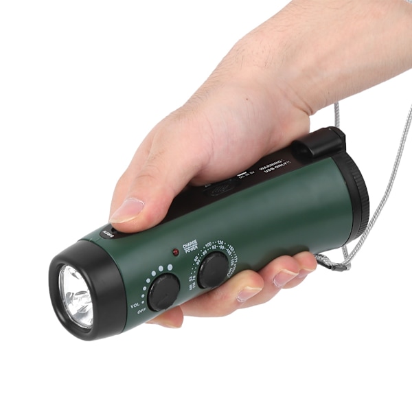 Plastisk utendørs håndsveiv multifunksjons lommelykt radio nød LED-lommelykt mobiltelefonlading grønn