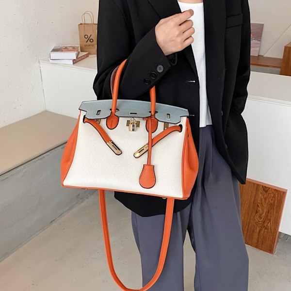 Stiligg og romslig oransje totebag for kvinner Orange
