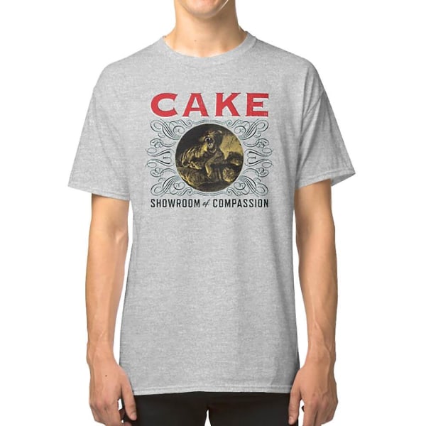 T-shirt med texten \"Cake band show room of compassion\" grey M