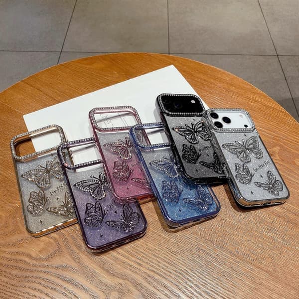 Etui til iPhone 17 Pro Max med rhinestone sommerfugldekor, TPU-bakside, sølv