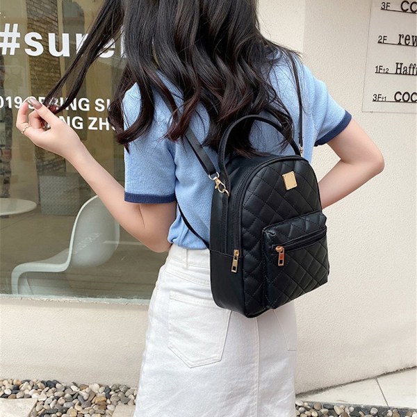 Olkalaukut Mini Reppu MUSTA1 black1