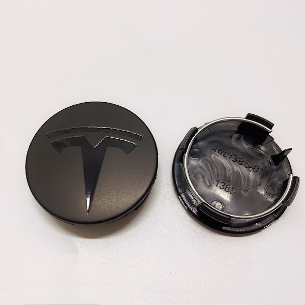 TSL02 - 56MM 4-pak Center dækker Tesla Black one size