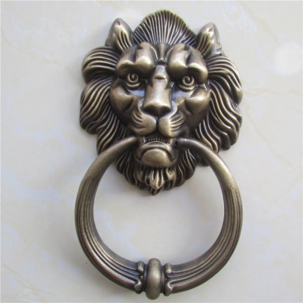 Dørhammer i form av et løvehode, bronse