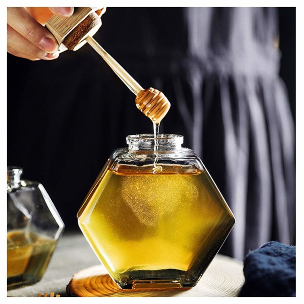 Honningkrukke i klart, tykt glas med sekskantet form med træske og korklåg Sirupbikube Dispenser Madopbevaringsbeholder til hjemmekøkken