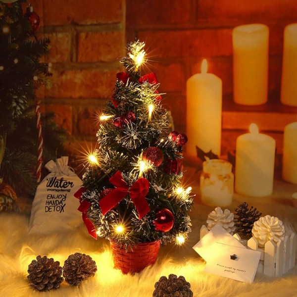 Lysande konstgjord julgran med vit snö, 40 cm liten bordsjulgran LED-ljusgirlanger med rosett och kotte