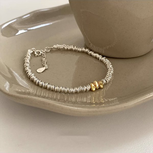 Högkvalitativt armband i guld och silverfärg, enkelt