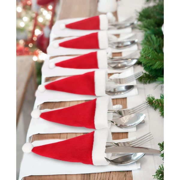 12 stycken jultomteluvor i silver, bestick, fest