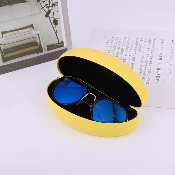 Hård låda med gula solglasögon, stor låda med klassiska solglasögon, g
