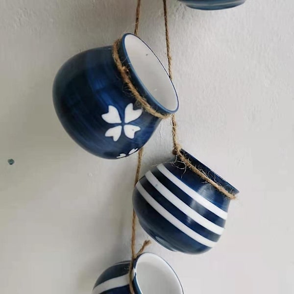 Sæt med 4 hængende blomsterpotter i lyse pastelfarver (blå)