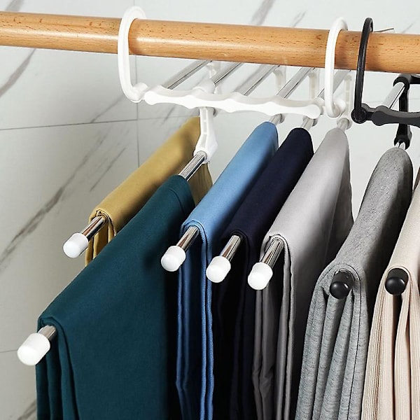 Pantalonginkuljettime Tilaa säästävät ripustuskoukut Tilaa säästävät pantalonginripustuskoukut Ruostumattomasta teräksestä valmistetut laajennettavat taikakoukut