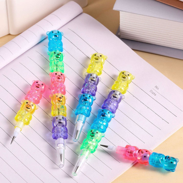 Pakkaa pinottavia muovisia värillisiä kyniä karhukuvioilla lapsille