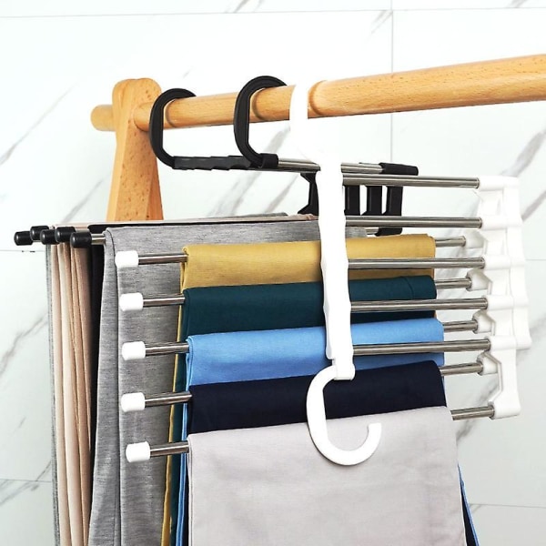 Pantalonginkuljettime Tilaa säästävät ripustuskoukut Tilaa säästävät pantalonginripustuskoukut Ruostumattomasta teräksestä valmistetut laajennettavat taikakoukut