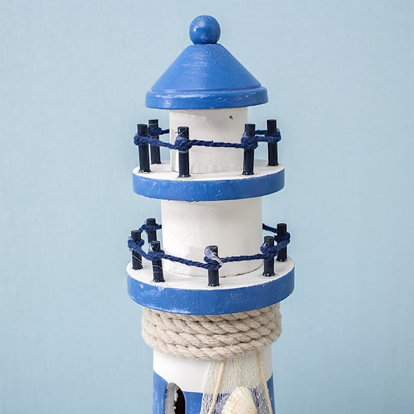 Blå och vit randig stor roder fyr Ocean Lighthouse W