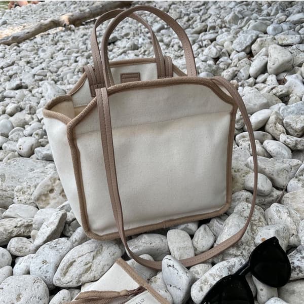 Beige babytaske i lærred
