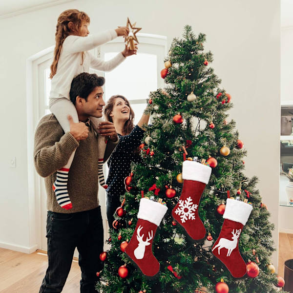 3 stycken julstrumpor träddekoration eldstad tomte