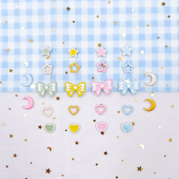 24 stjärnformade broderade strykmärken