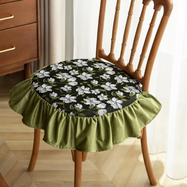 Vaaleanvihreä tuolinpehmuste vintage-pitsillä
